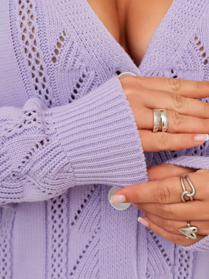 Lavina Cardigan by Lauven showcasing long lavender knit with ruffles and button closure.