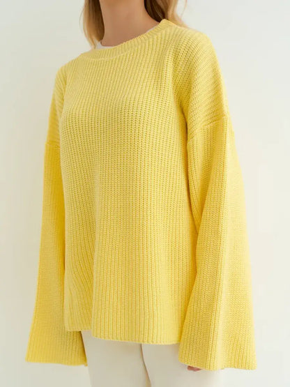Lemonade Sweater by Lauven in oversized knit featuring a soft lemon yellow hue and wide sleeves.