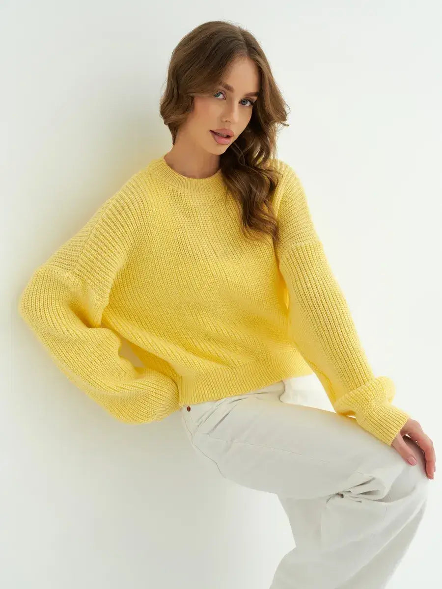 Lemonade Sweater by Lauven, an oversized knit in bright yellow, perfect for cool days and transitional seasons.