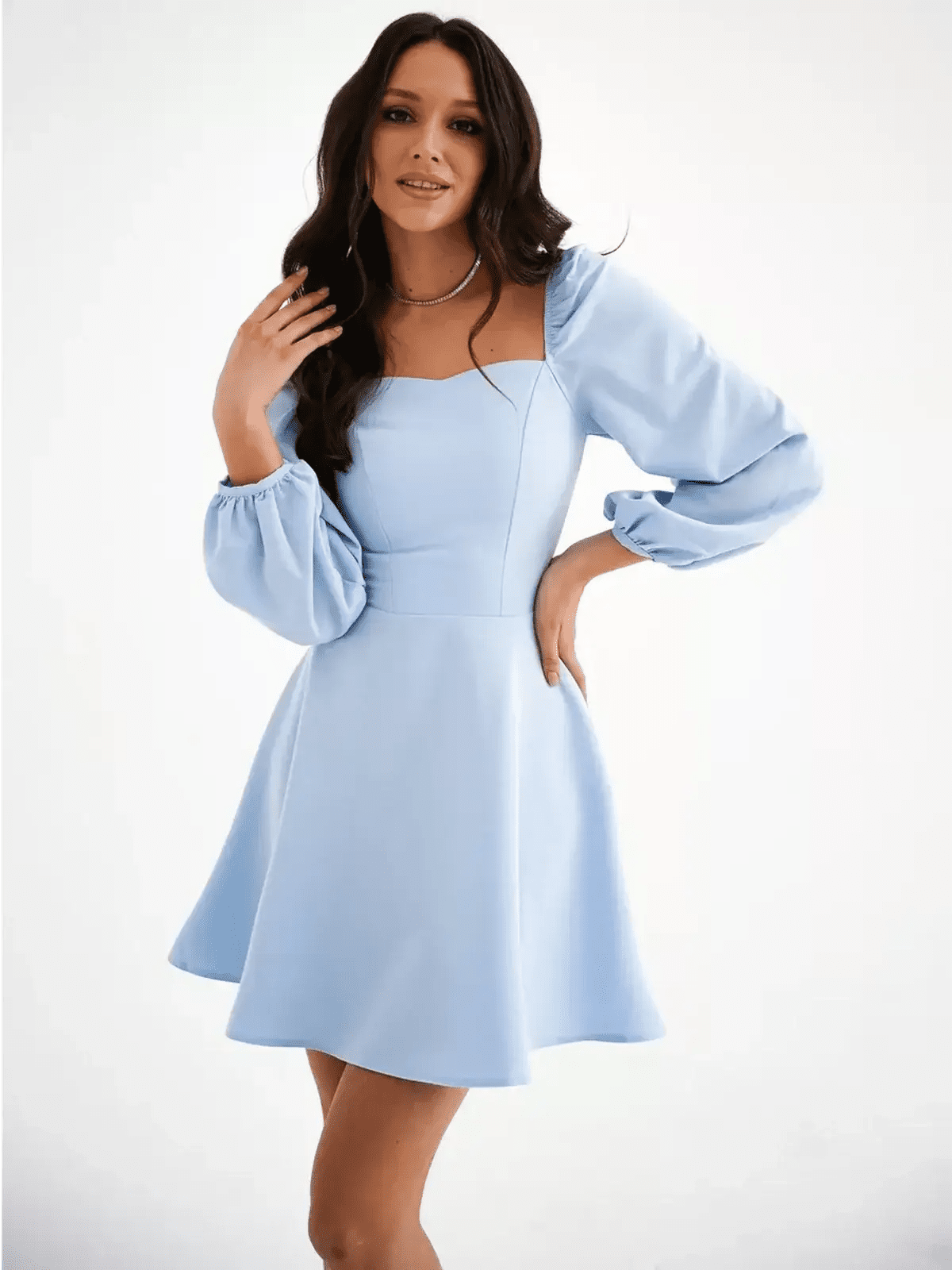 Light blue mini dress with square neckline and puffed sleeves, perfect for summer, weddings, and special occasions.
