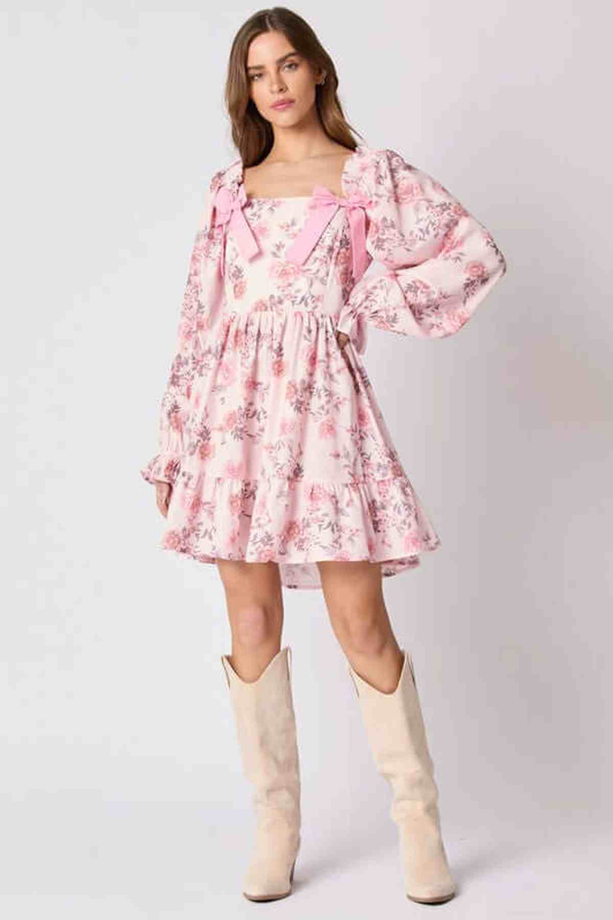 Lila Mini Dress for women in pink floral print with bow accents, perfect for summer or wedding guest attire.