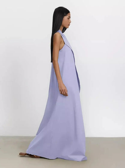 Lilac Flow Maxi Dress showcasing one-shoulder elegance and sculptural draping for summer style.