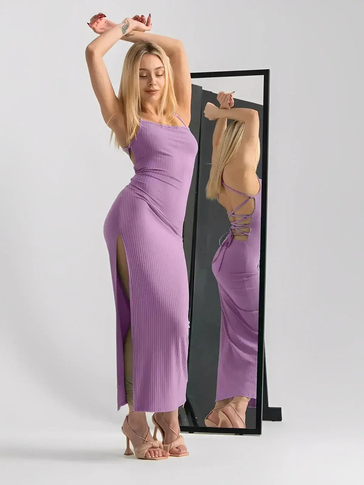 Lilac Lace Midi Dress by Lauven featuring a strappy ribbed design, lace-up back, and high side slits for added allure.