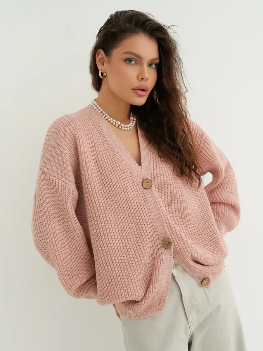 Liora Cardigan by Lauven, soft powder pink oversized knitwear with textured fabric and button details.