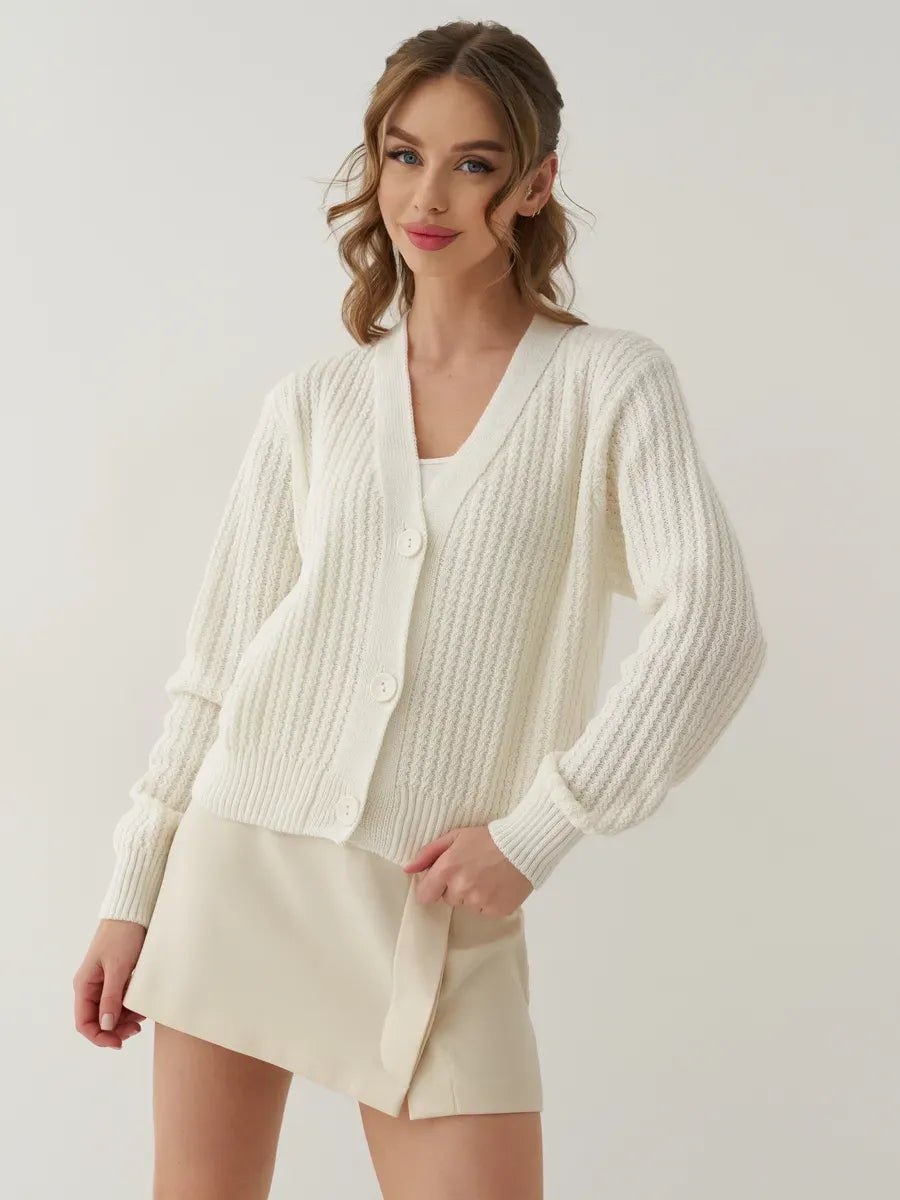 Luna Cardigan by Lauven: Oversized cropped knitwear in cream, perfect for layering and stylish comfort.