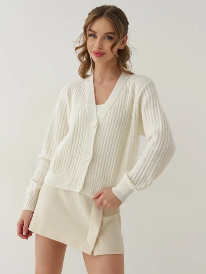 Luna Cardigan by Lauven: Oversized cropped knitwear in cream, perfect for layering and stylish comfort.
