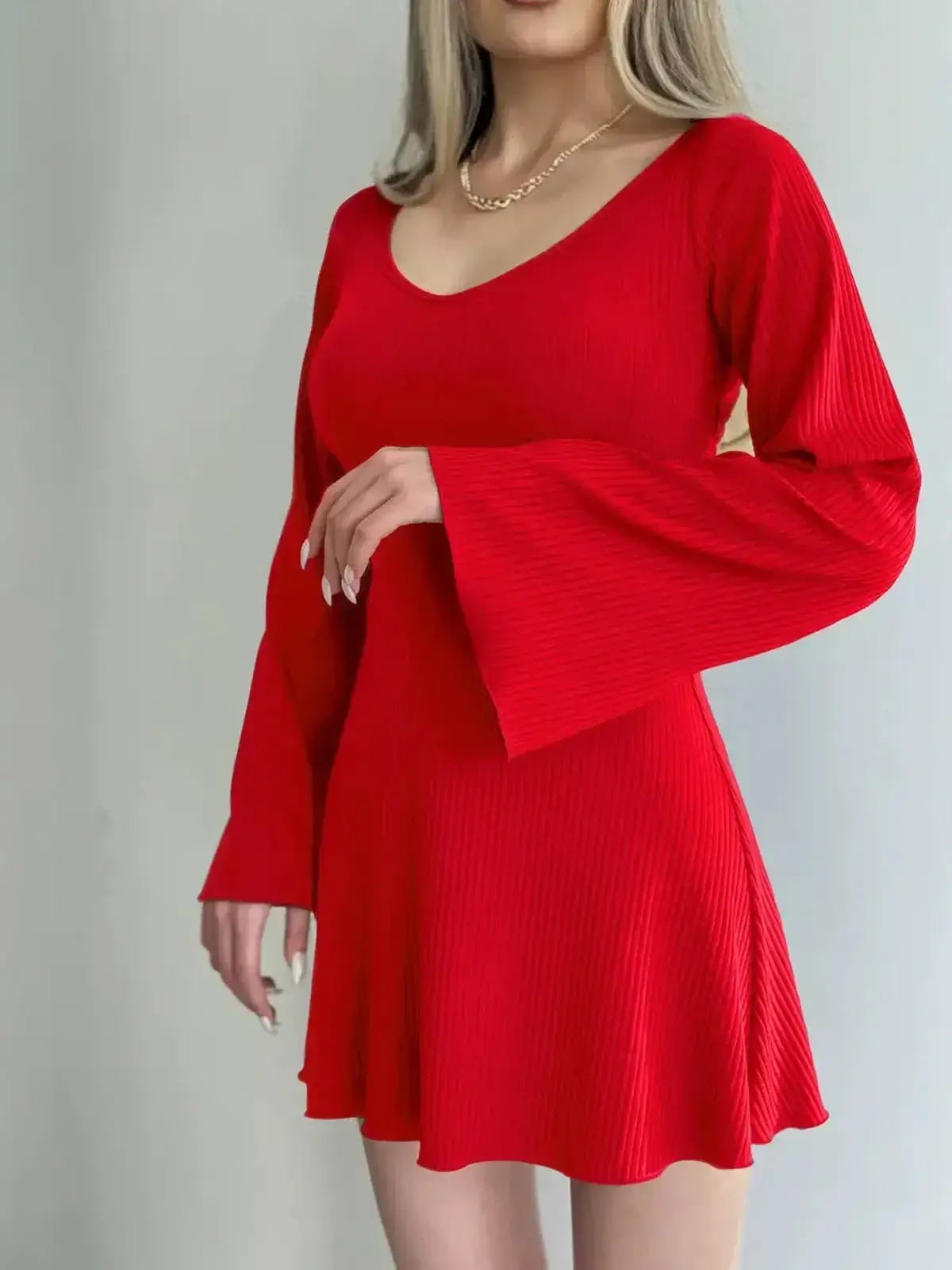 Red Luna Flare Mini Dress with sculpting fit and dramatic bell sleeves perfect for summer events and casual outings.