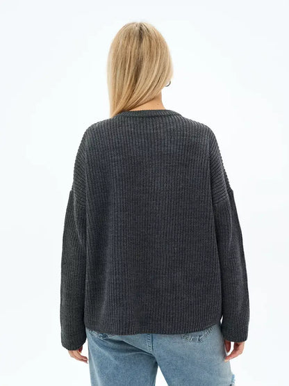 Luna Sweater by Lauven, oversized knit in charcoal gray, showcasing a relaxed silhouette and textured fabric.