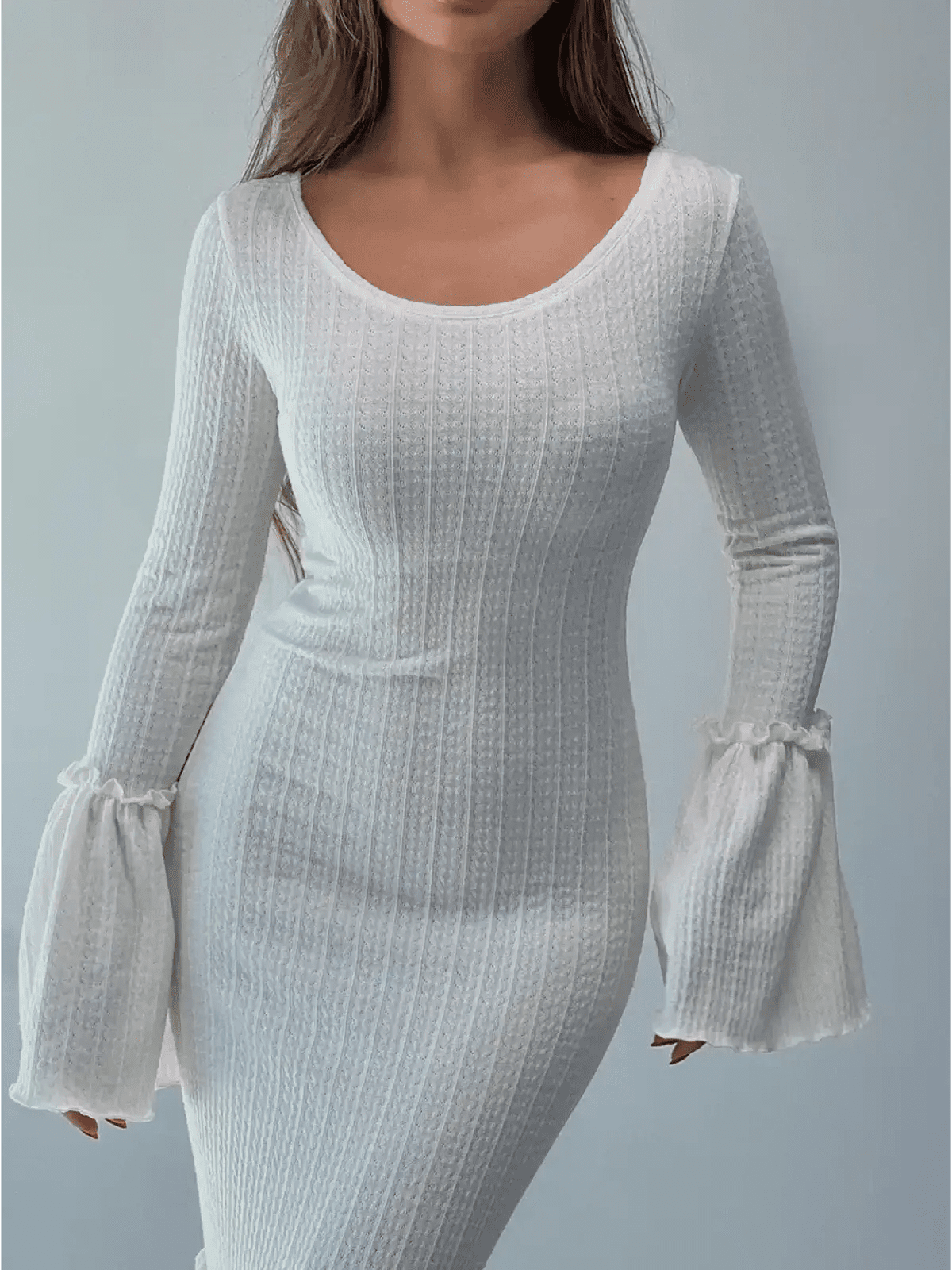 Lustre Maxi Dress featuring sculpted knit silhouette and voluminous bell sleeves, beautifully draping form-fitting design.