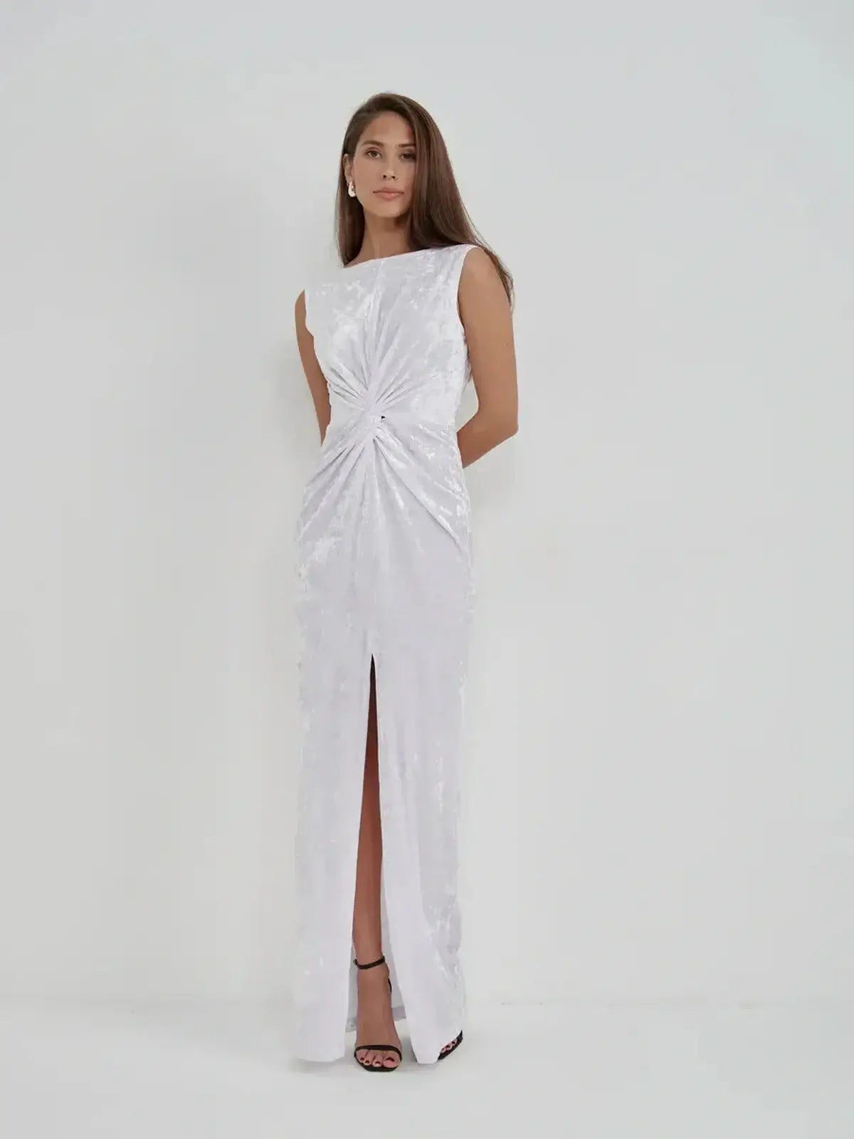 Lustre Twist Maxi Dress in white crushed velvet, featuring a twist detail and elegant slit for evening wear.