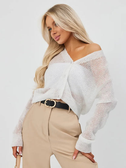 Luxe Cardigan by Lauven showcasing an oversized mohair-blend design in soft ivory, styled with relaxed pants.