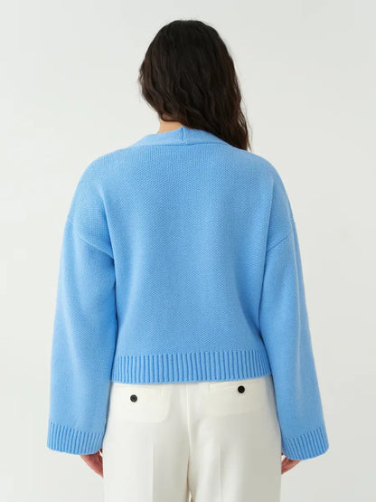 Lyra Cardigan by Lauven - Back view of cropped blue knit with wide sleeves and textured design.