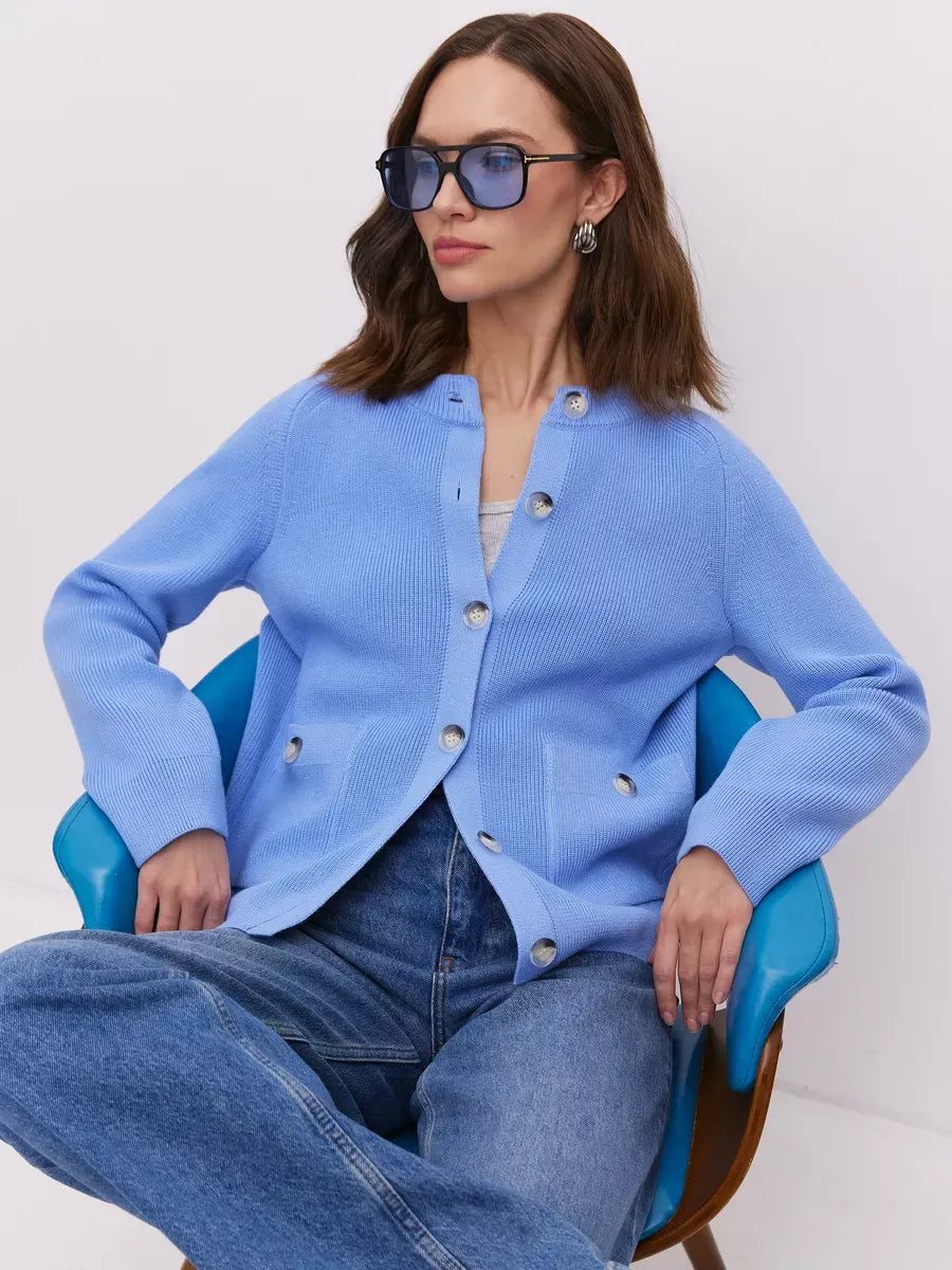 Lyra Cardigan by Lauven in soft blue, featuring a button-up design and stylish silhouette, perfect for layering.