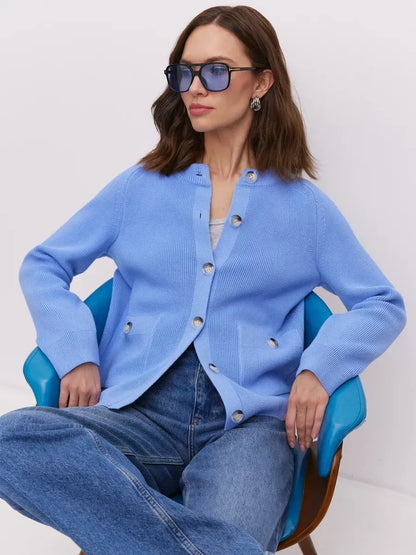 Lyra Cardigan by Lauven in soft blue, featuring a button-up design and stylish silhouette, perfect for layering.