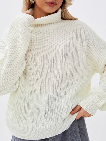 Lyra Sweater by Lauven: Oversized knit in ivory with high neck, combining elegance and comfort.