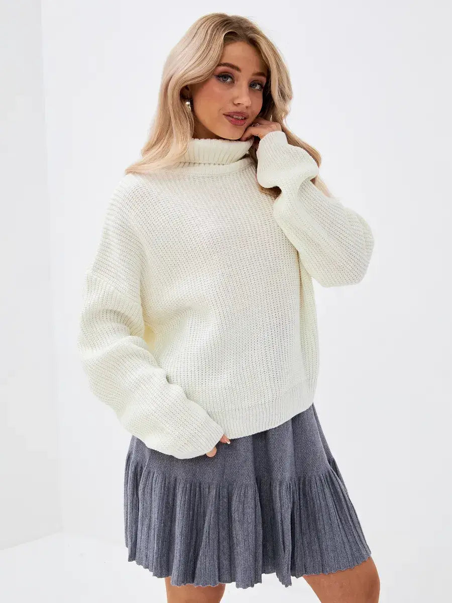 Lyra Sweater by Lauven—oversized knit in ivory with a high neck, perfect for stylish layering.