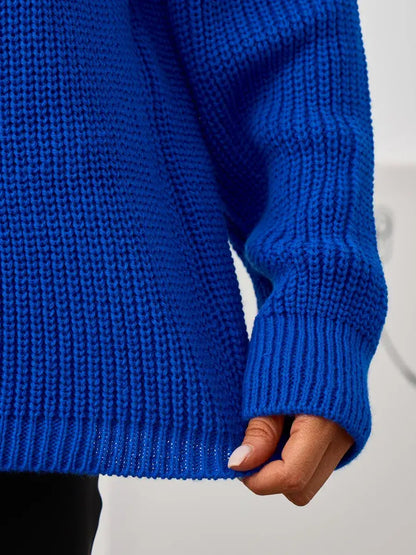 Lyra Sweater by Lauven, showcasing an oversized blue knit with a textured finish and relaxed fit.