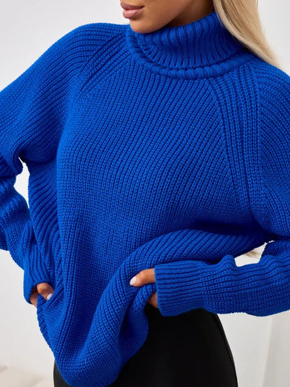 Lyra Sweater by Lauven — Oversized blue knit with turtleneck elegance for a cozy yet stylish look.