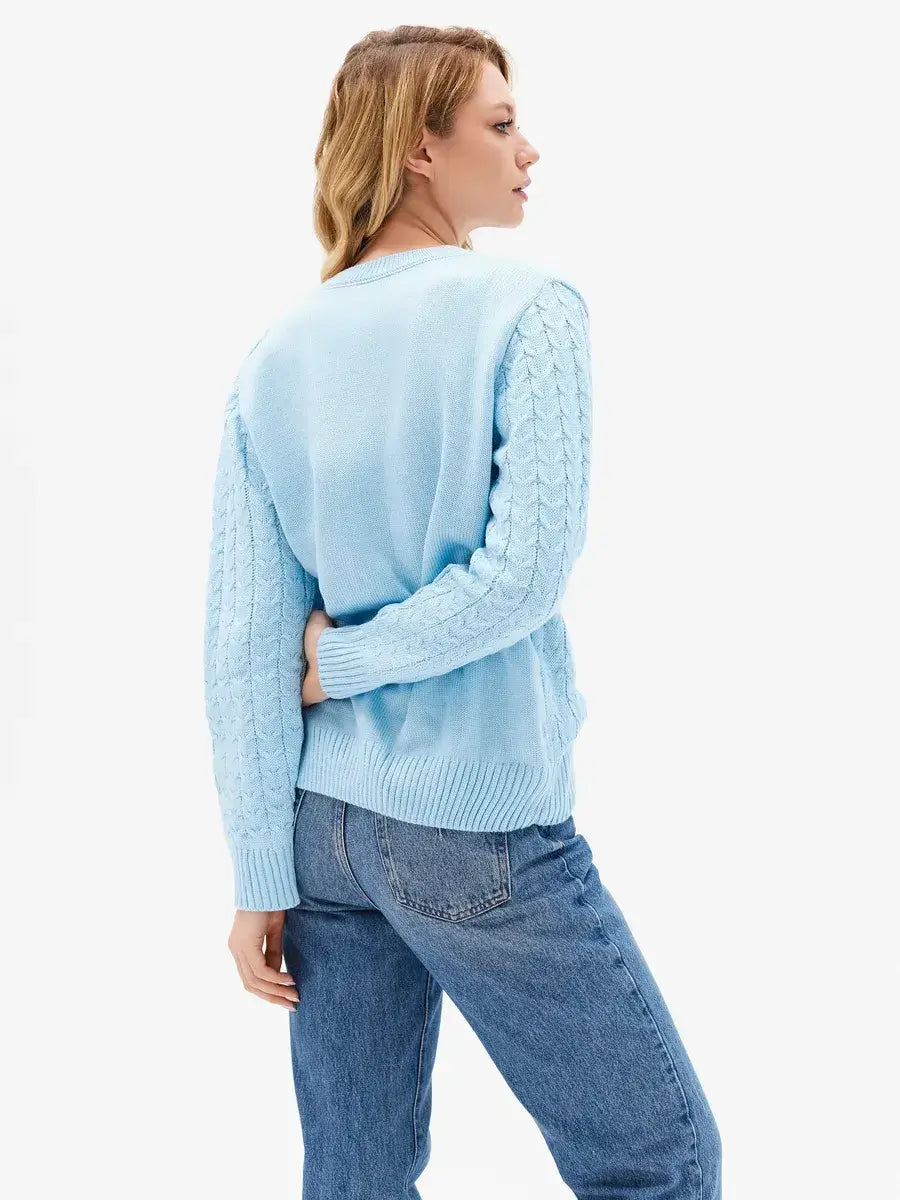 Lyra Sweater by Lauven – Light blue cable knit back view, showcasing stylish comfort and elegance.