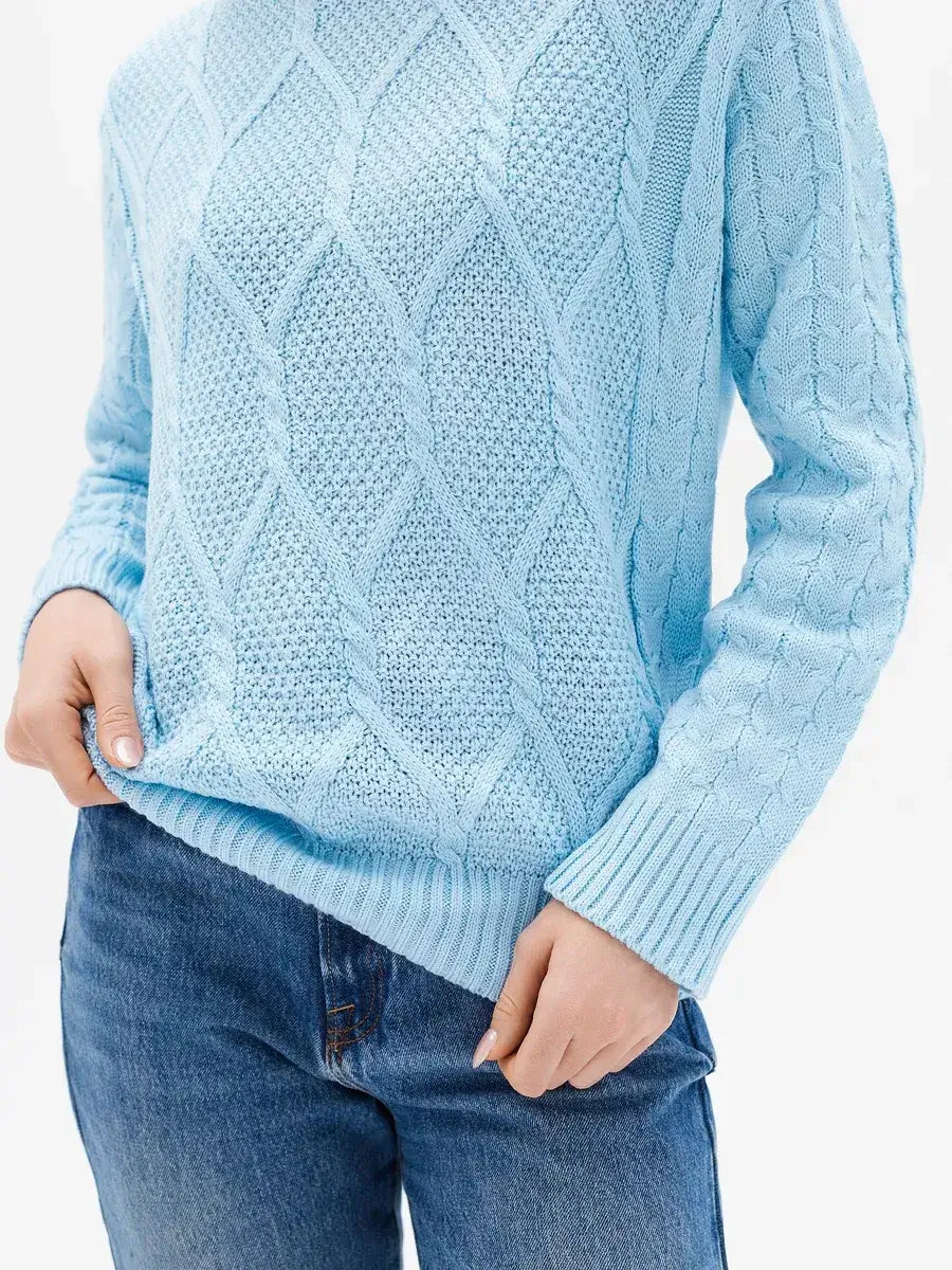 Lyra Sweater from Lauven - Light blue cable knit design showcasing elegance and comfort in a stylish outfit.