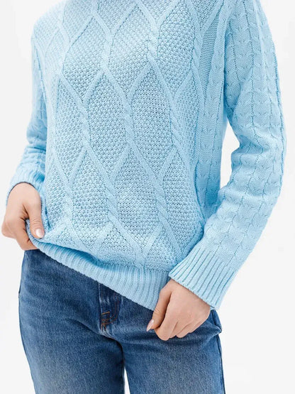 Lyra Sweater from Lauven - Light blue cable knit design showcasing elegance and comfort in a stylish outfit.