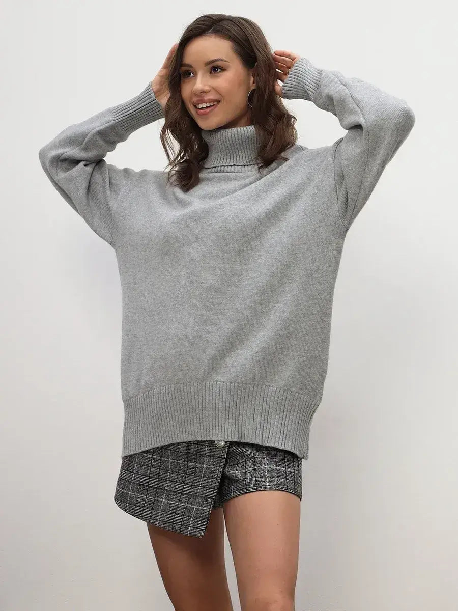 Lyra Sweater by Lauven in light grey featuring a cozy turtleneck and relaxed fit, perfect for stylish layering.