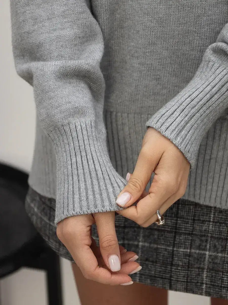 Lyra Sweater by Lauven showcasing light grey knitwear details and cozy sophistication.