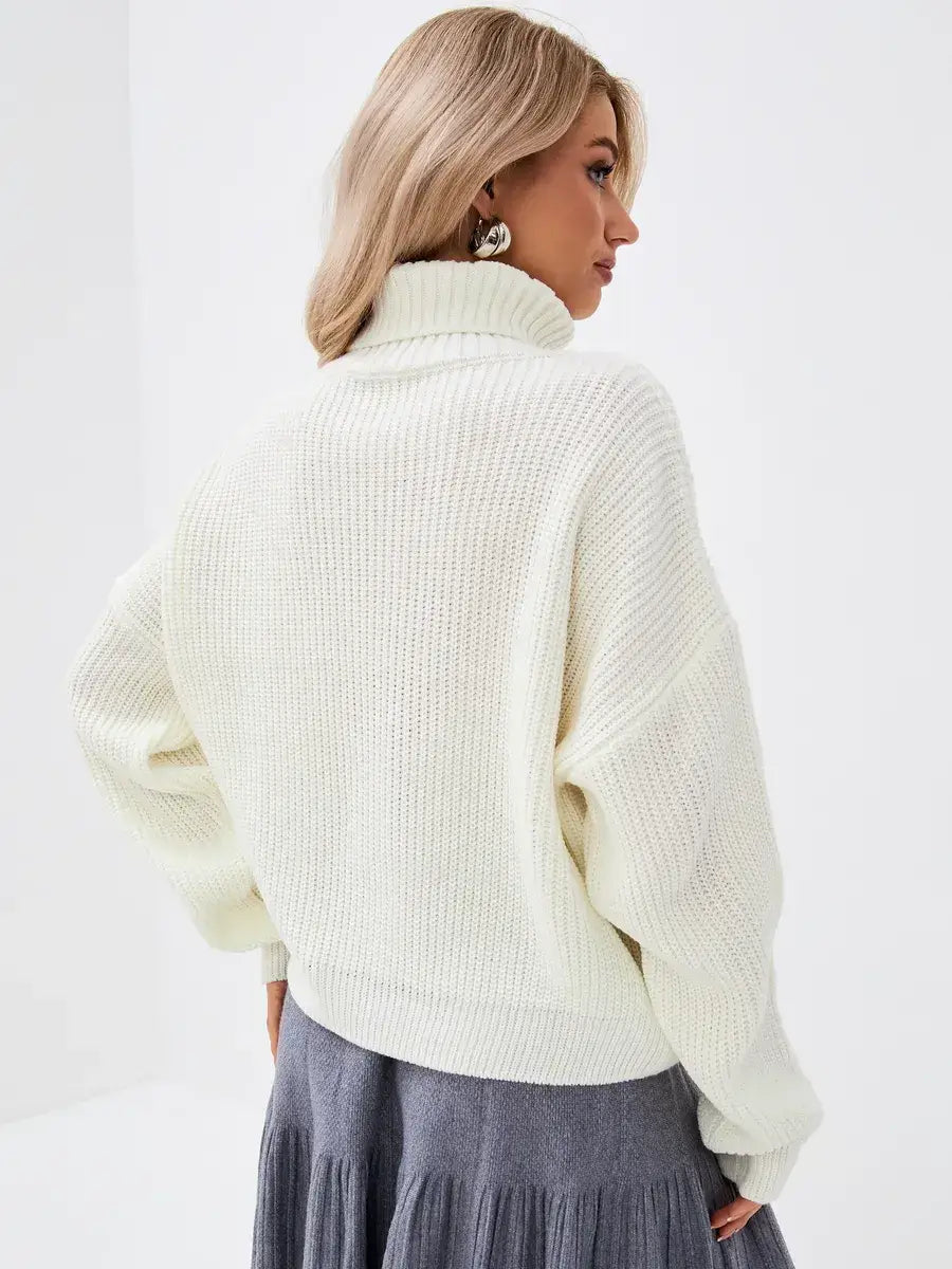 Lyra Sweater by Lauven, oversized knit with high neck in ivory, showcasing modern elegance and comfort.