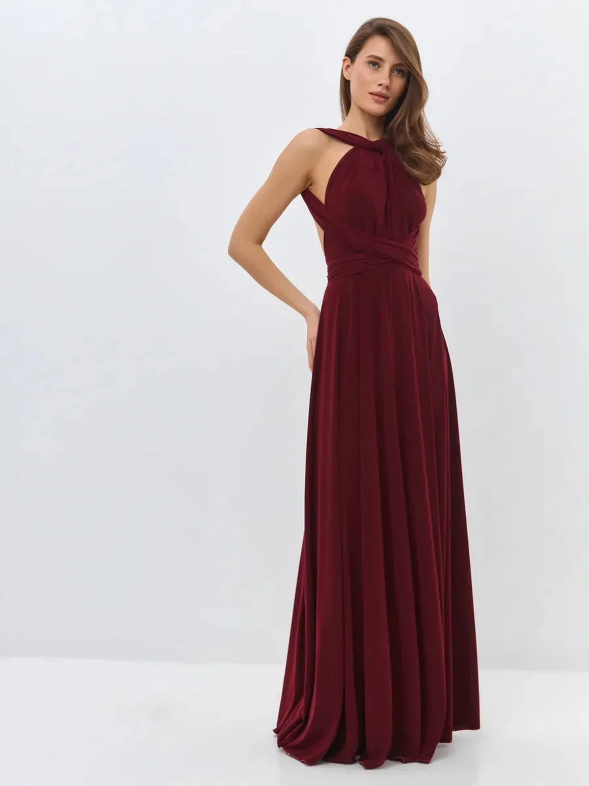 Elegant Bordeaux Muse Maxi Dress featuring a convertible silhouette and backless design, perfect for formal occasions.