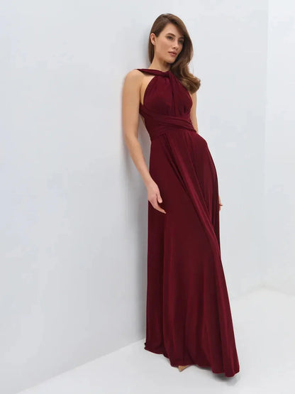 Maxi Dress Bordeaux Muse on model, showcasing backless design and elegant draping in rich wine color.