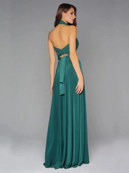 Back view of a dark green Maxi Dress Empress Drape with flowing silhouette and convertible straps.
