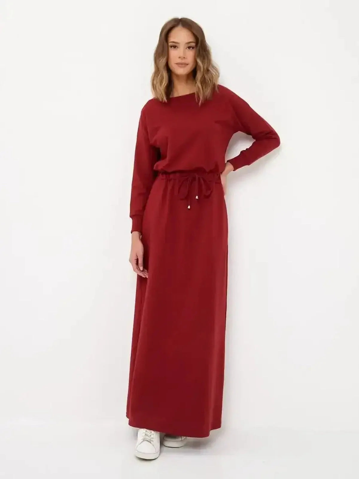 Stylish red maxi dress with long sleeves and drawstring waist, perfect for casual and formal occasions.