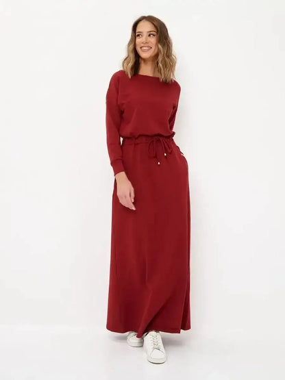 Elegant red maxi dress with long sleeves and drawstring waist, perfect for casual chic and formal occasions.