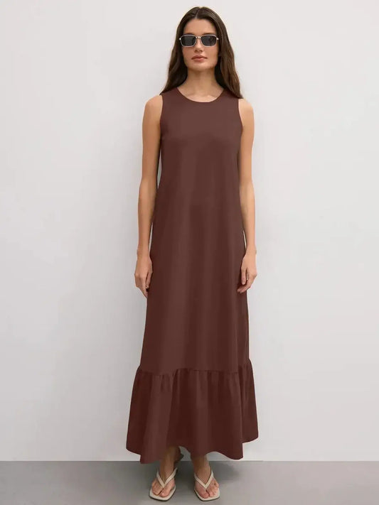 Maxi Dress Reverie in chocolate brown with sleeveless design and ruffle hem, perfect for casual elegance.