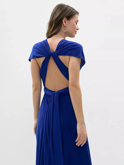 Elegant back view of the sapphire blue maxi dress showcasing its twisted open back design.