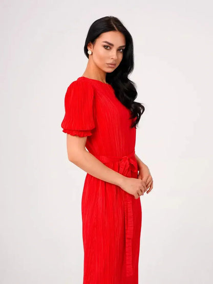 Red Maxi Dress Solaria with pleated fabric and belted waist, perfect for summer events and special occasions.