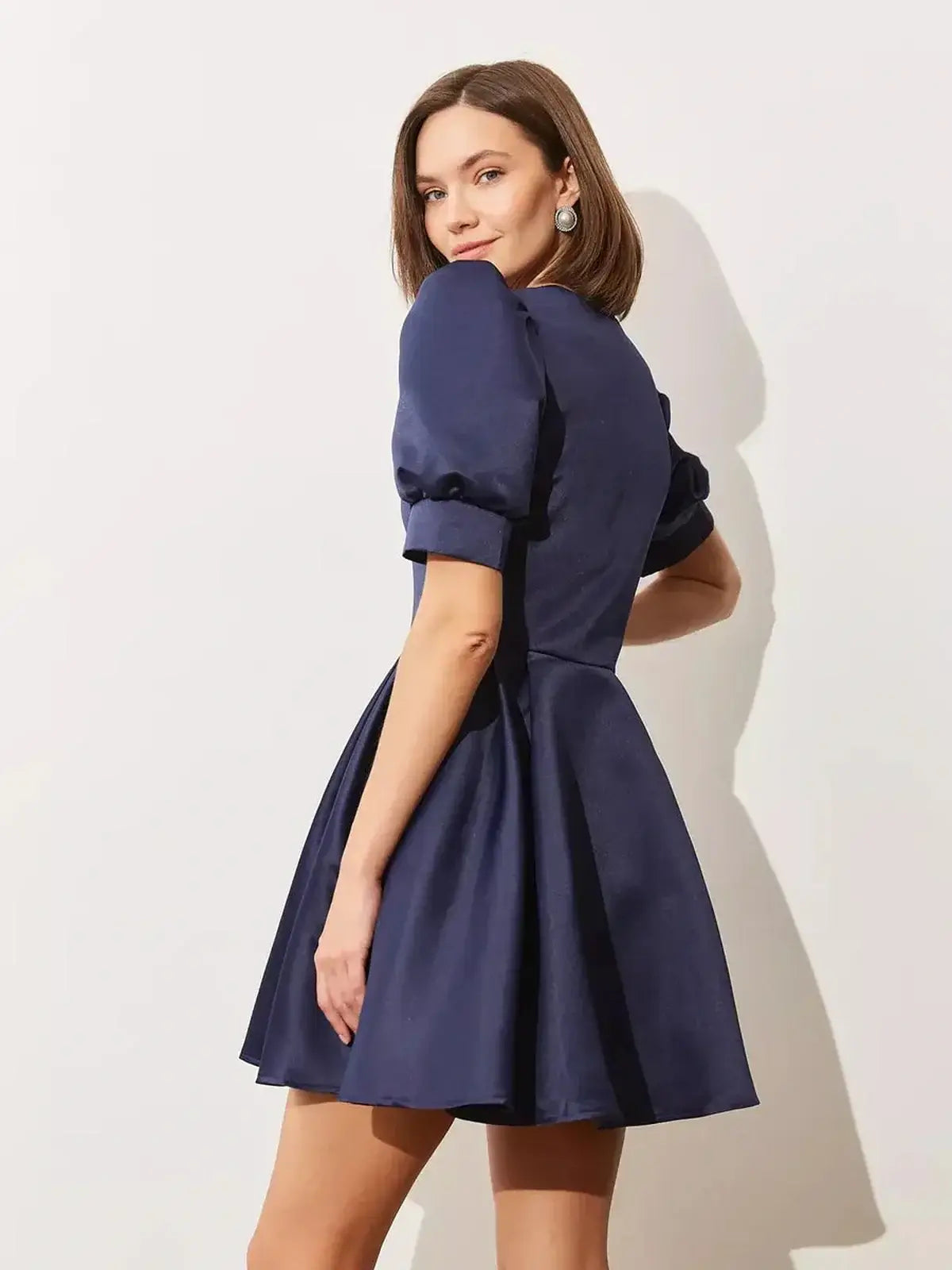 Elegant Midnight Bloom Mini Dress with puff sleeves and satin finish, perfect for weddings and special occasions.