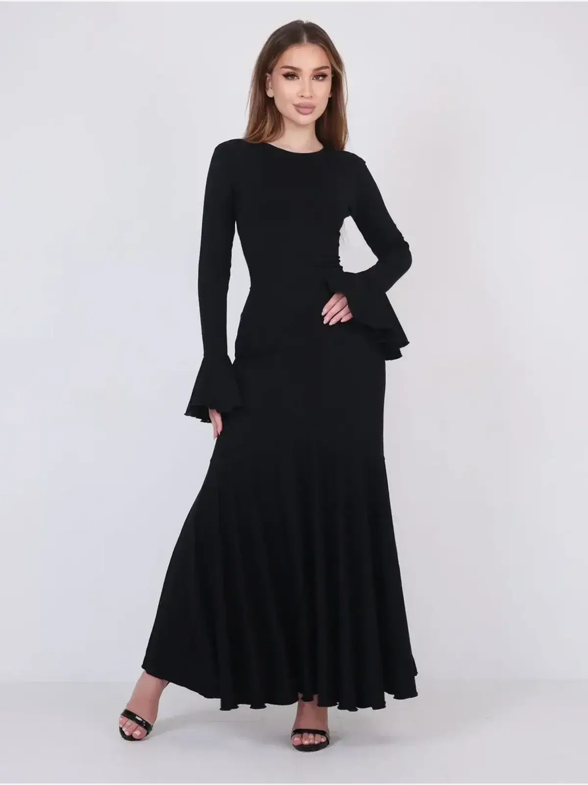 Elegant black Mirage Maxi Dress featuring flared cuffs and a fishtail hem, perfect for evening wear.