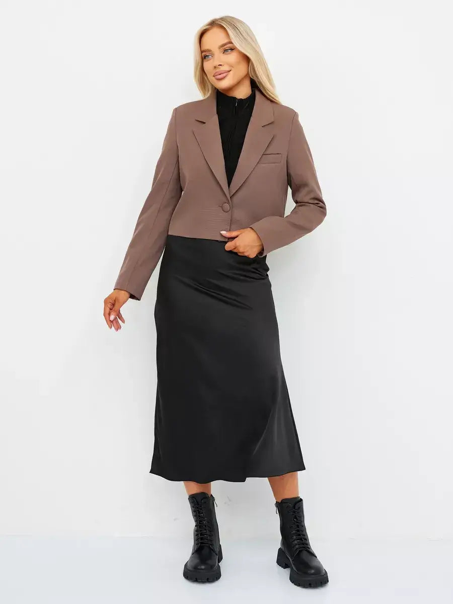 Mocha Blazer by Lauven worn with a black skirt, showcasing oversized cropped tailored design in rich brown.