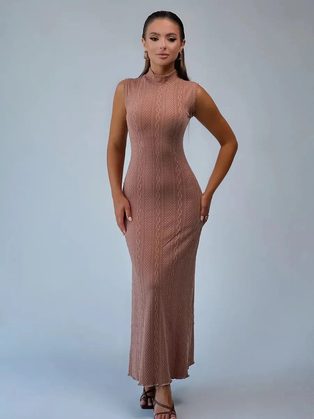 Museline Maxi Dress in cocoa-toned jacquard, showcasing a sleek bodycon fit and modern stand collar.