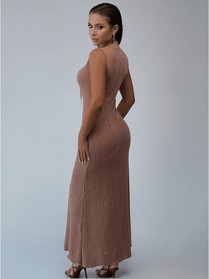 Back view of Museline Maxi Dress in cocoa jacquard, showcasing its sleek bodycon fit and modern stand collar.