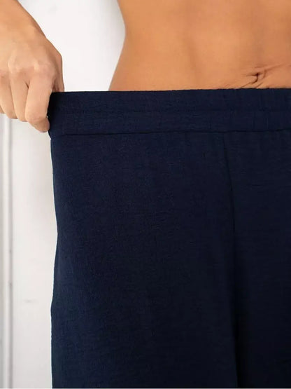 Navy Suit Set featuring wide-leg trousers with an adjustable waistband from Lauven brand.