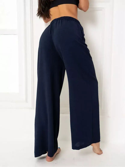 Navy Suit Set - Back view of wide-leg navy trousers from Lauven, showcasing stylish and breathable fabric.