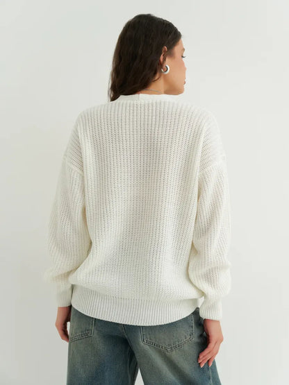 Noelle Cardigan by Lauven, elegant white oversized knitwear with button detailing, perfect for layering.