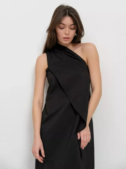 Elegant one-shoulder Noir Fold Maxi Dress featuring structured drape detail in black fabric.