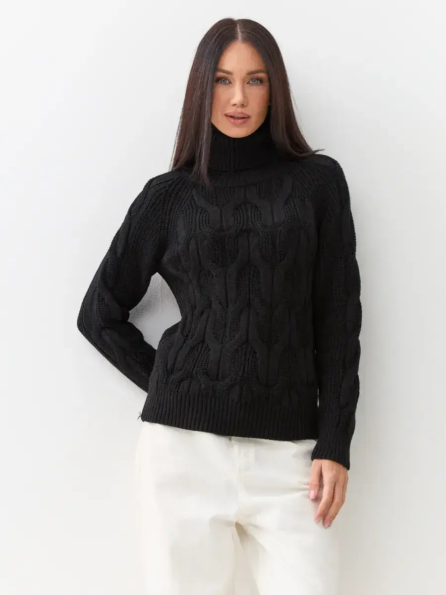 Noir Knitwear by Lauven: Women's black wool-blend turtleneck sweater with chunky cable-knit design.