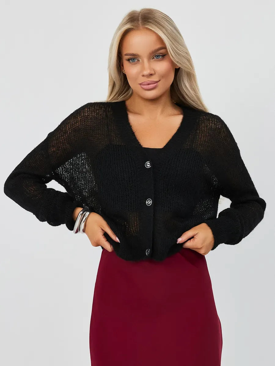 Model wearing Noir Luxe Cardigan by Lauven in black, showcasing oversized mohair-blend knitwear with dropped shoulders.