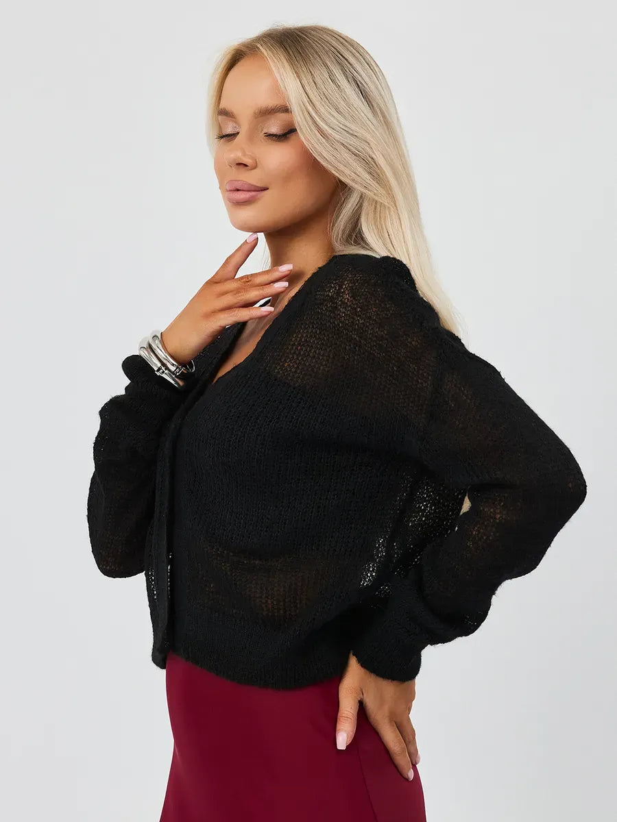 Model wearing Noir Luxe Cardigan by Lauven, a chic oversized mohair-blend knitwear in elegant black.