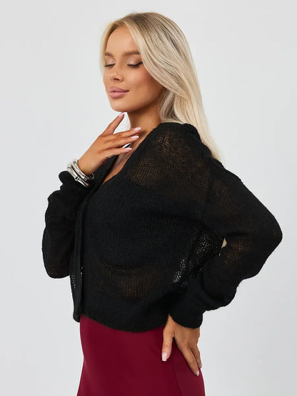 Model wearing Noir Luxe Cardigan by Lauven, a chic oversized mohair-blend knitwear in elegant black.
