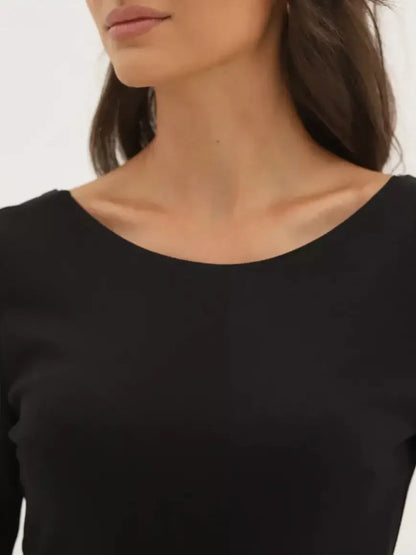 Noir Midi Dress by Lauven - close-up of sleek black fabric and elegant neckline design.
